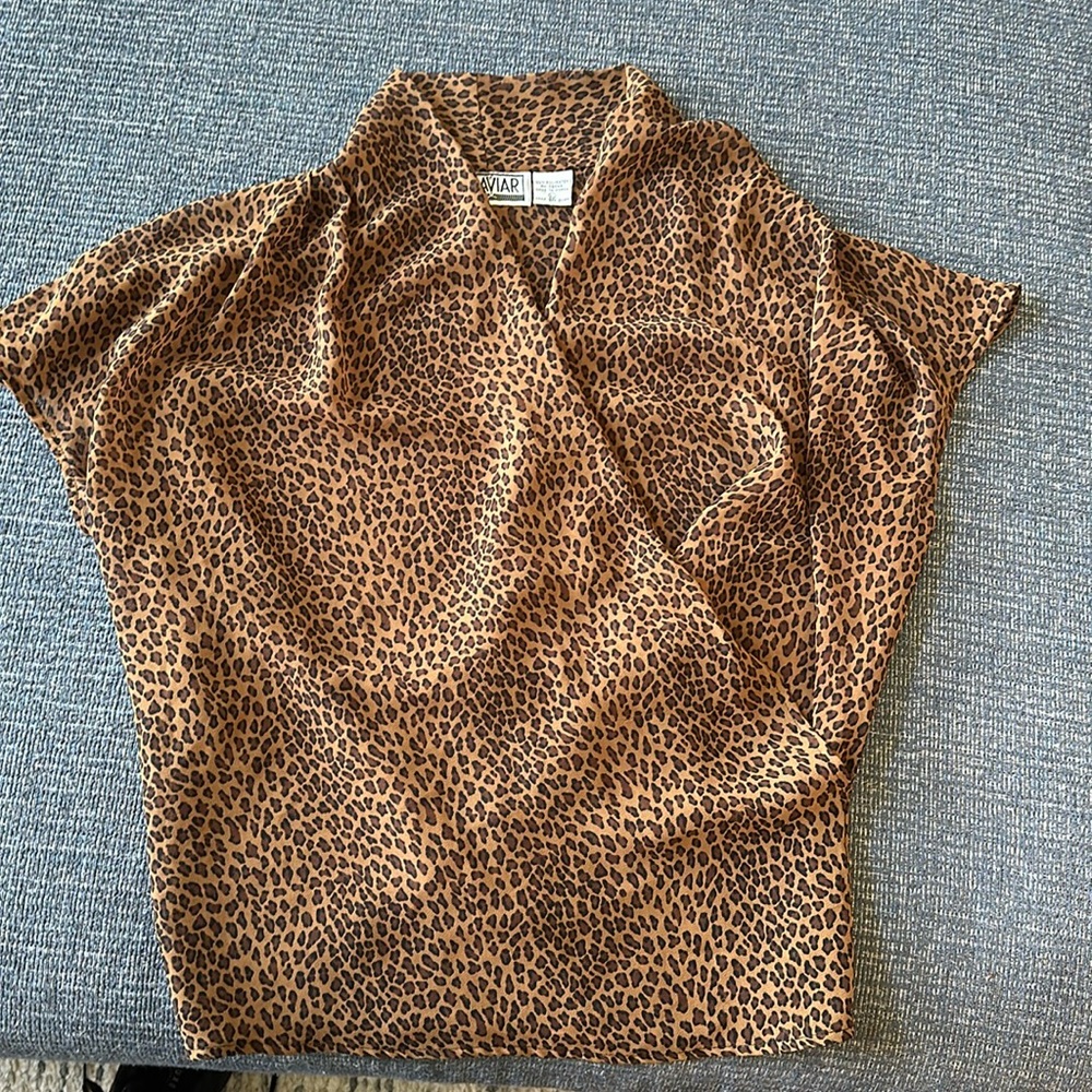 Animal print top. Le Caviar. Size large.